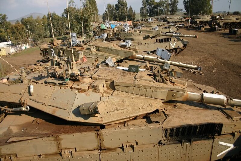 Military tanks in a storage yard