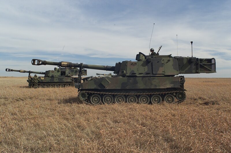 Military tanks in field