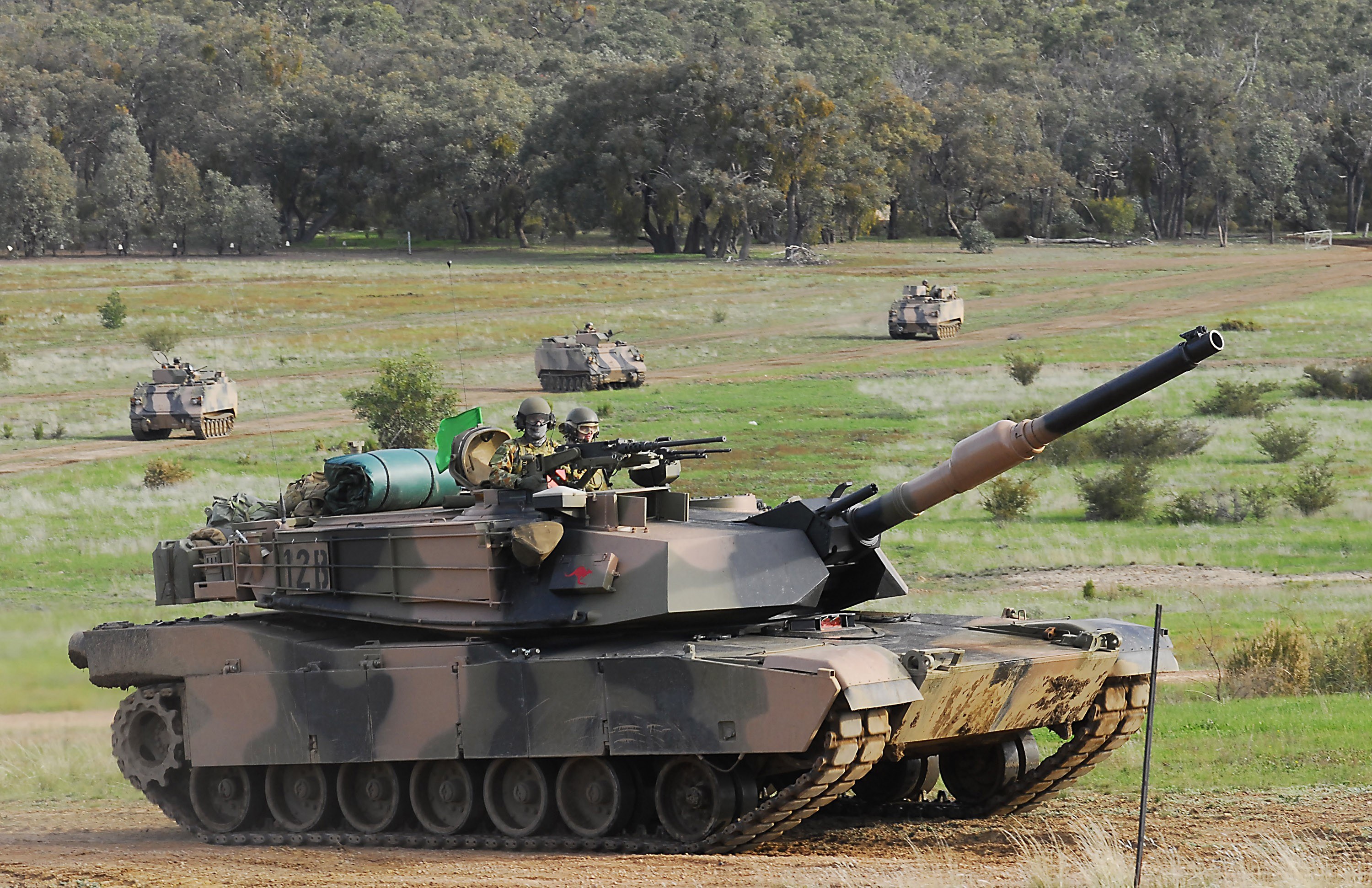 Military tanks in field exercise