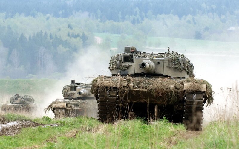 Military Tanks in Field — Green, Dramatic