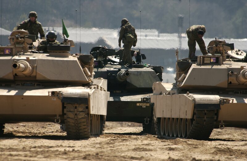 Military Tanks in Formation — Tan