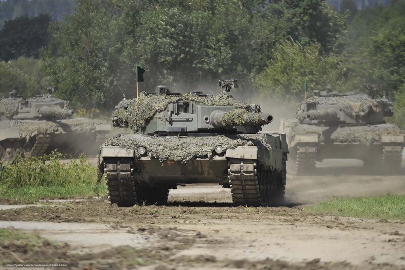 Military Tanks in Motion — Green