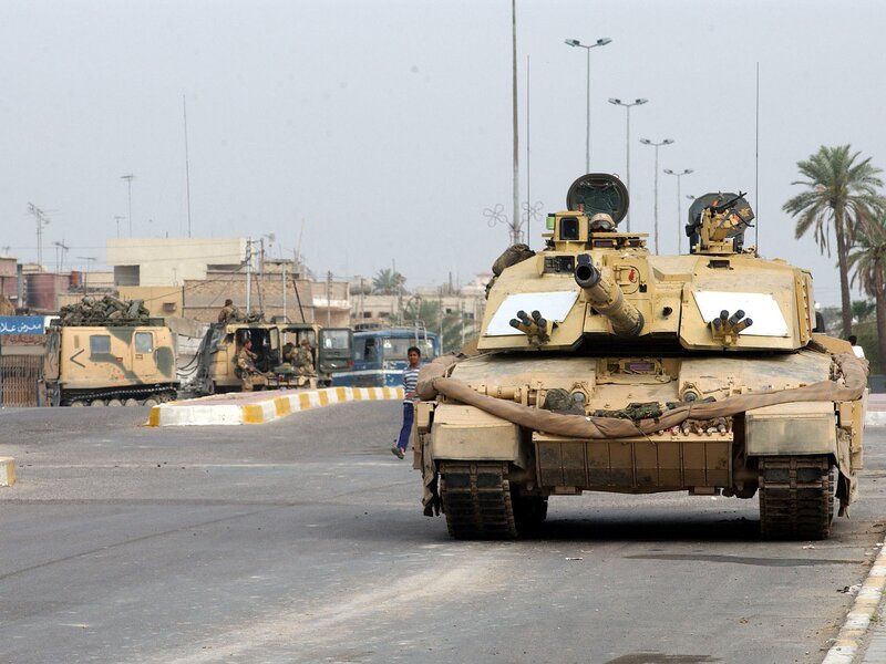Military tanks on a city street