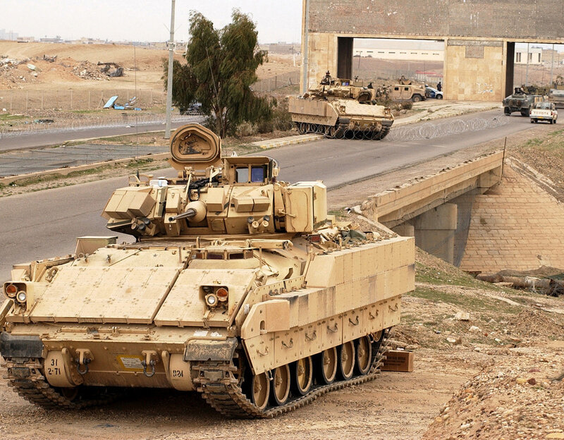 Military tanks on a road