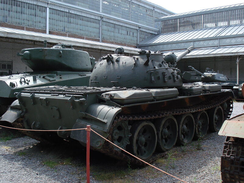 Military Tanks on Display — Green, Neutral, Afternoon