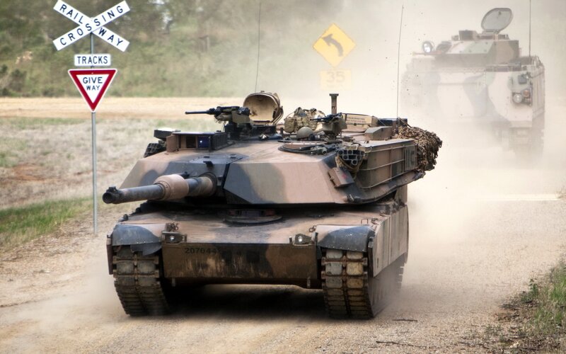 Military Tanks on Road — Brown