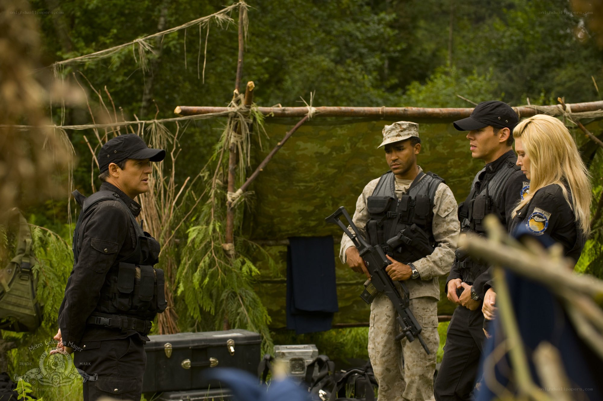 military team in forest camp