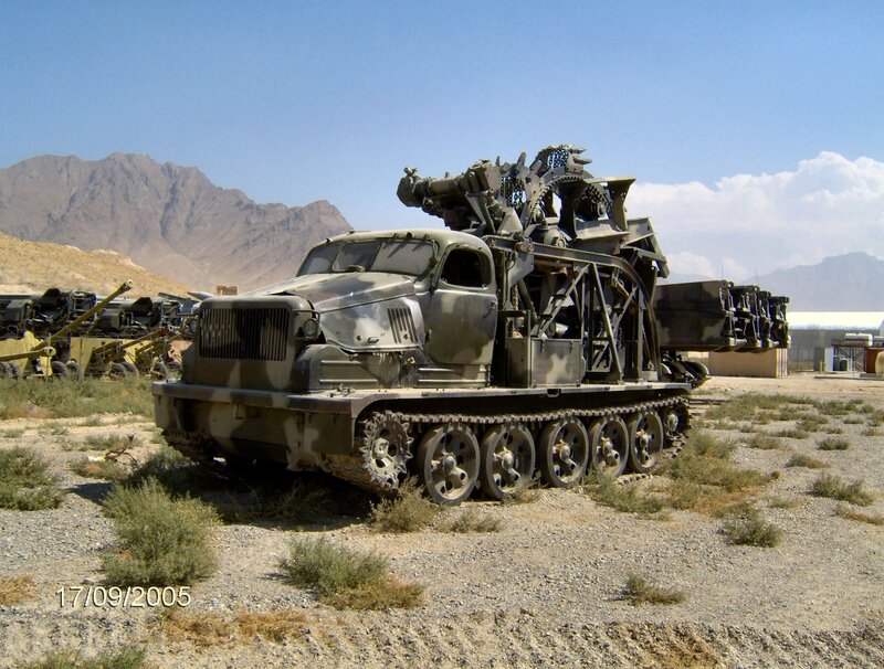 Military tracked vehicle in desert