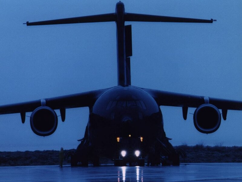 military transport aircraft at dusk