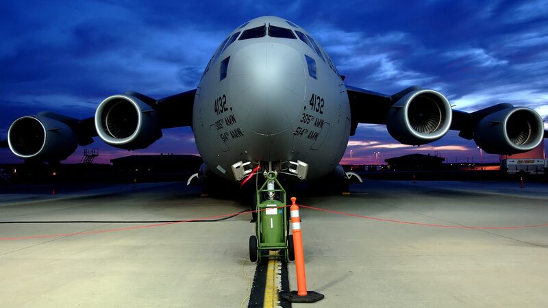 Military transport aircraft at dusk