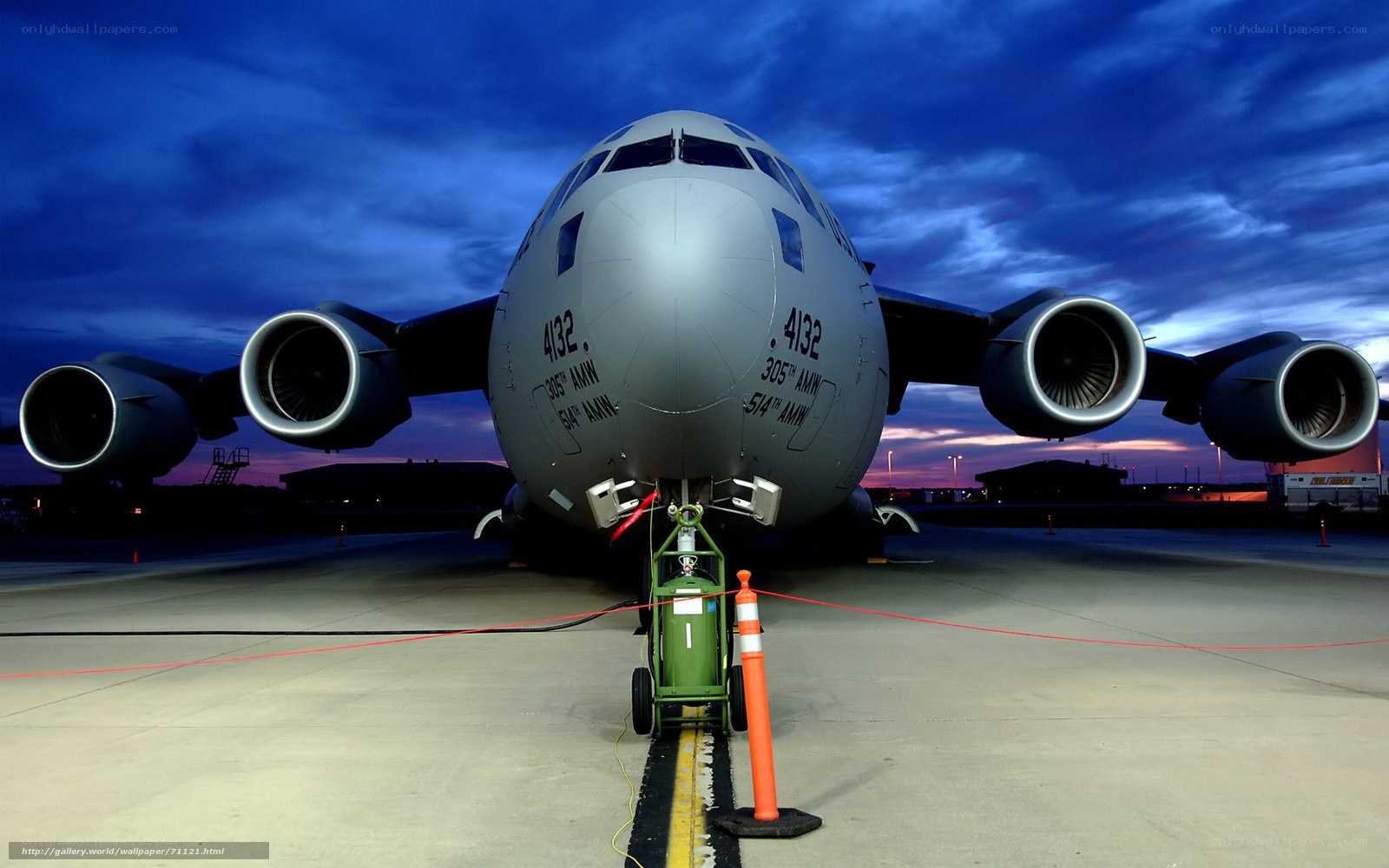 Military transport aircraft at dusk