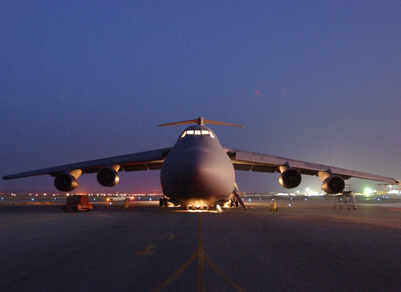 Military transport aircraft at night