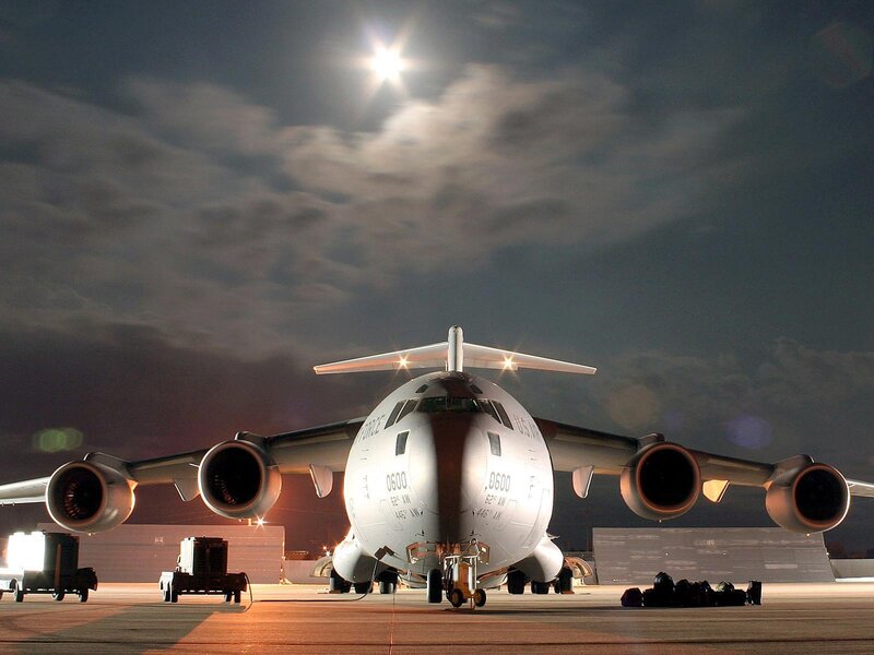 Military transport aircraft at night