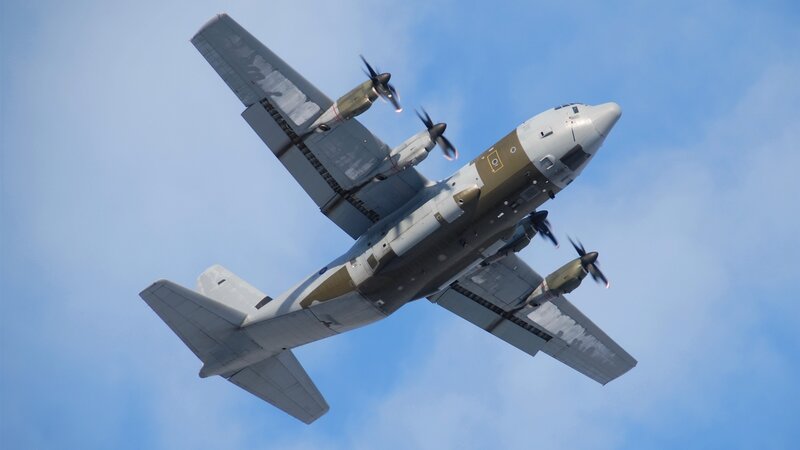 Military Transport Plane — Blue, Dynamic, Afternoon