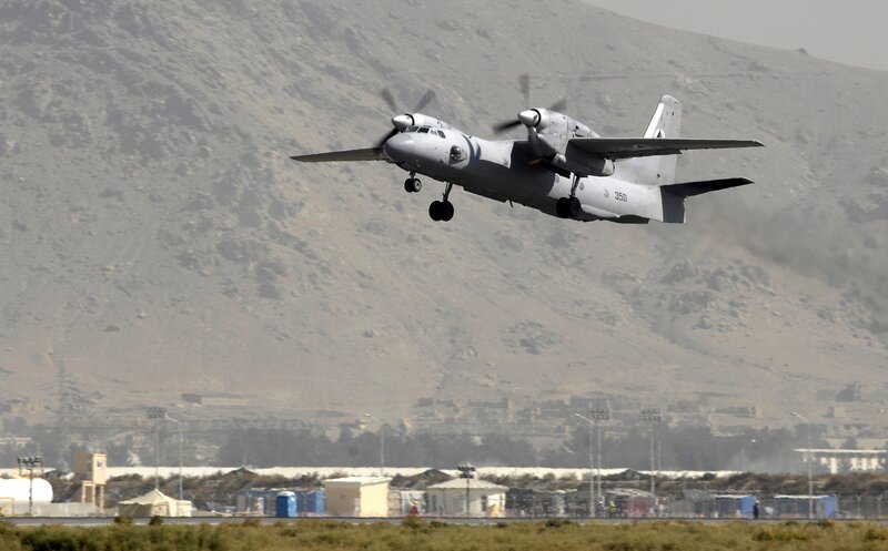 Military Transport Plane — Gray, Dramatic, Afternoon, Photograph, Mountain