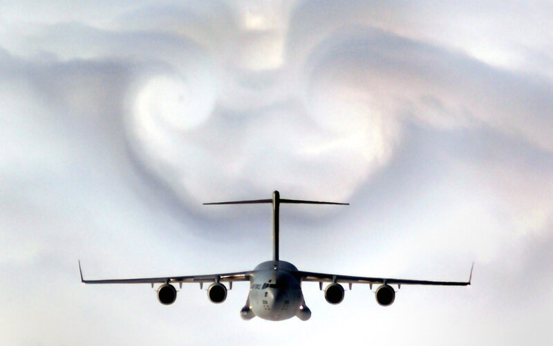 Military Transport Plane — Gray, Dramatic, Photograph, Clouds, Wings