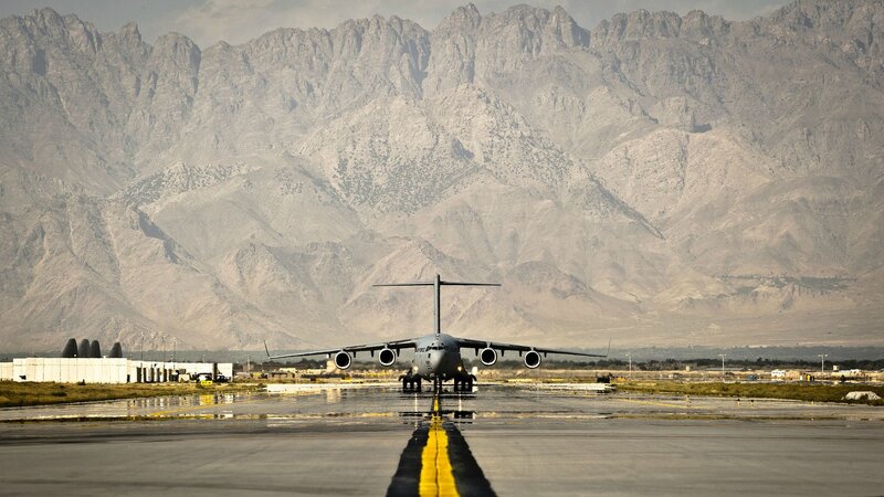 Military Transport Plane — Gray, Dramatic, Photograph, Mountains, Runway, Aircraft