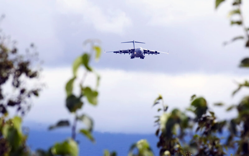 military transport plane in flight