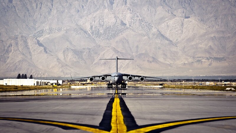 military transport plane on runway