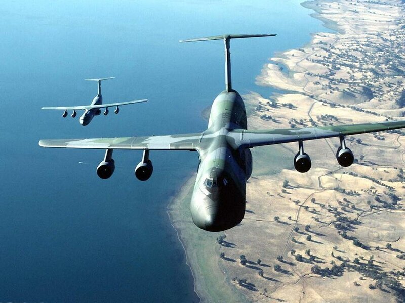 Military transport planes in flight