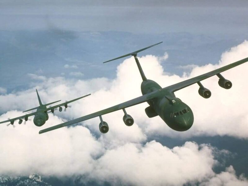 Military transport planes in flight