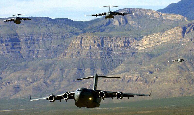 Military transport planes in formation