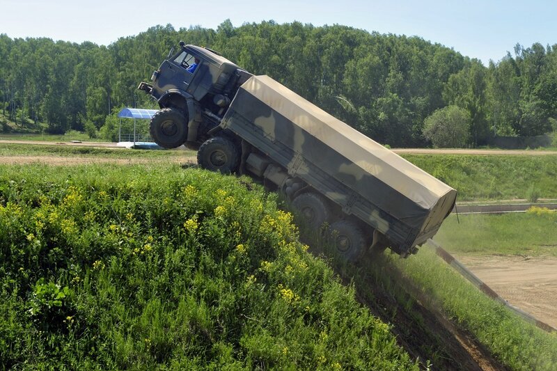 Military truck climbing hill