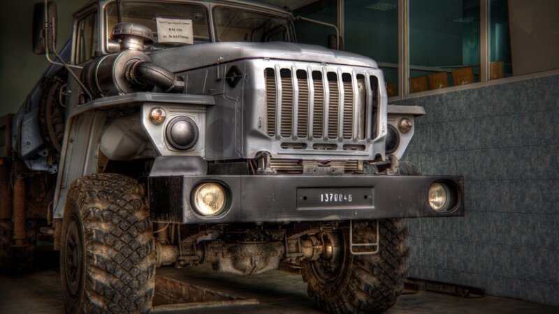 Military truck in a garage