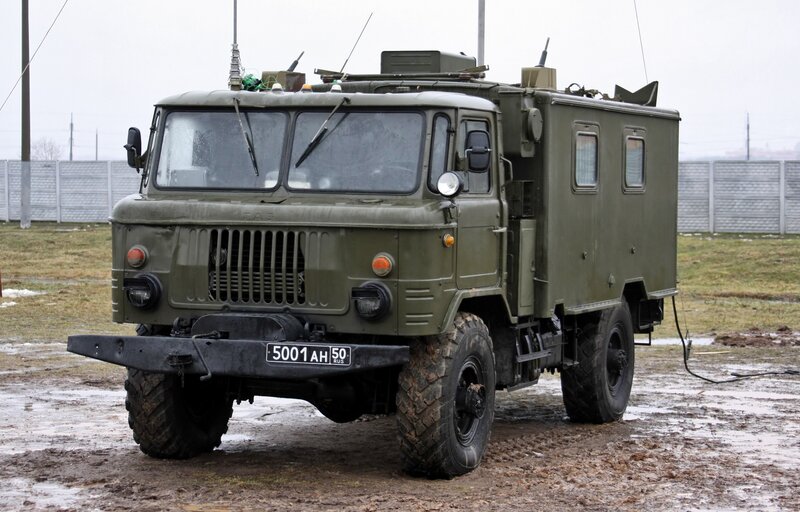 Military truck in muddy field