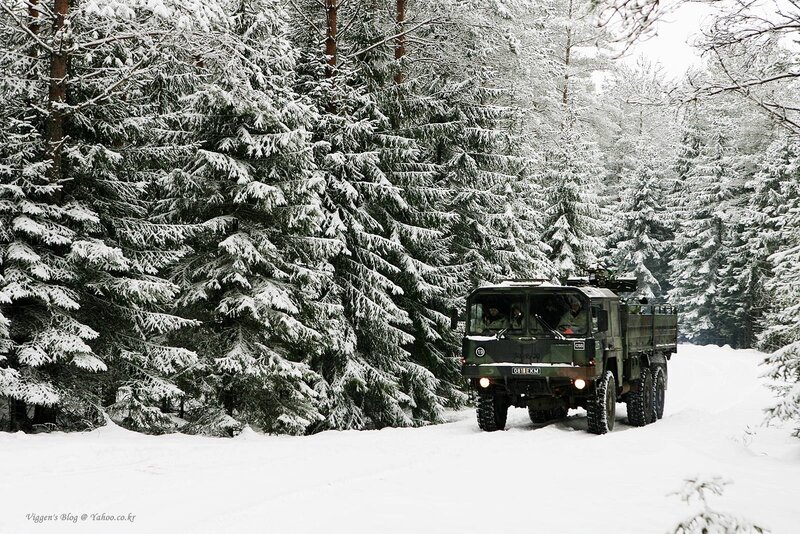 Military Truck in Snow — White
