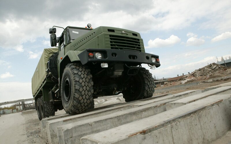 Military truck on concrete steps