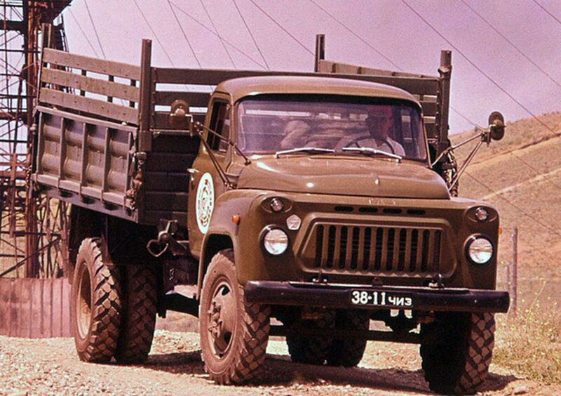 Military truck on dirt road