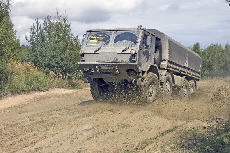 Military truck on muddy road