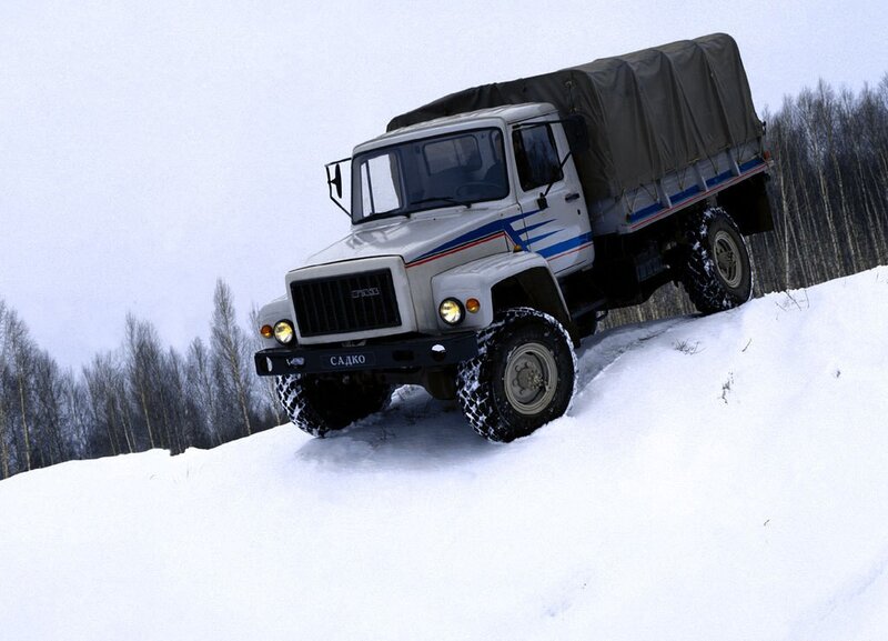 Military truck on snowy hill
