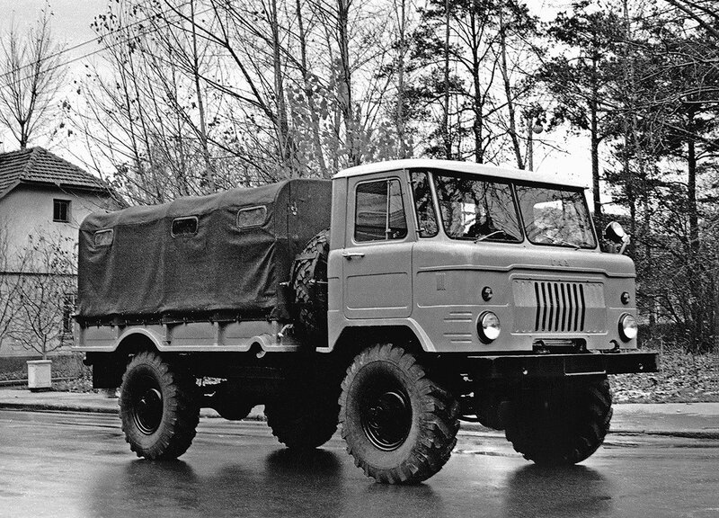 Military truck on wet road