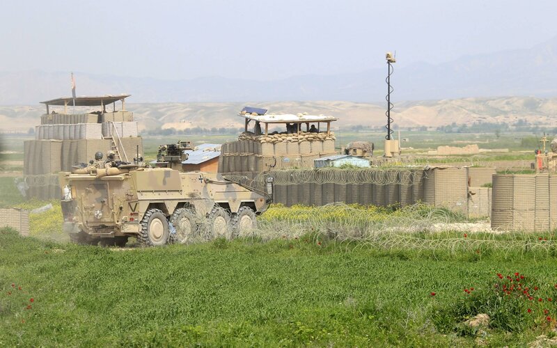 Military vehicle at fortified base
