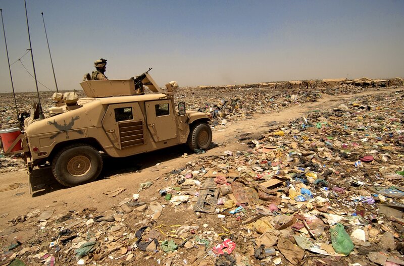 Military vehicle at landfill site