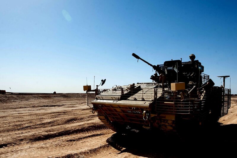 Military vehicle in desert
