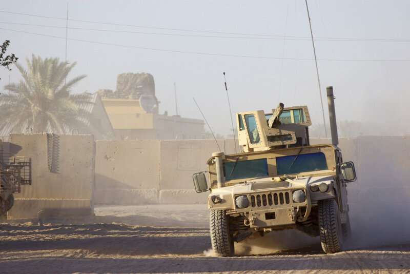 Military vehicle in desert environment