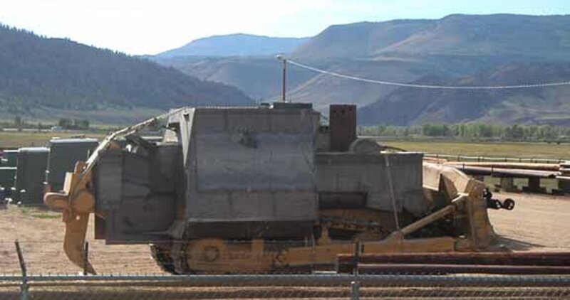 Military vehicle in mountainous area