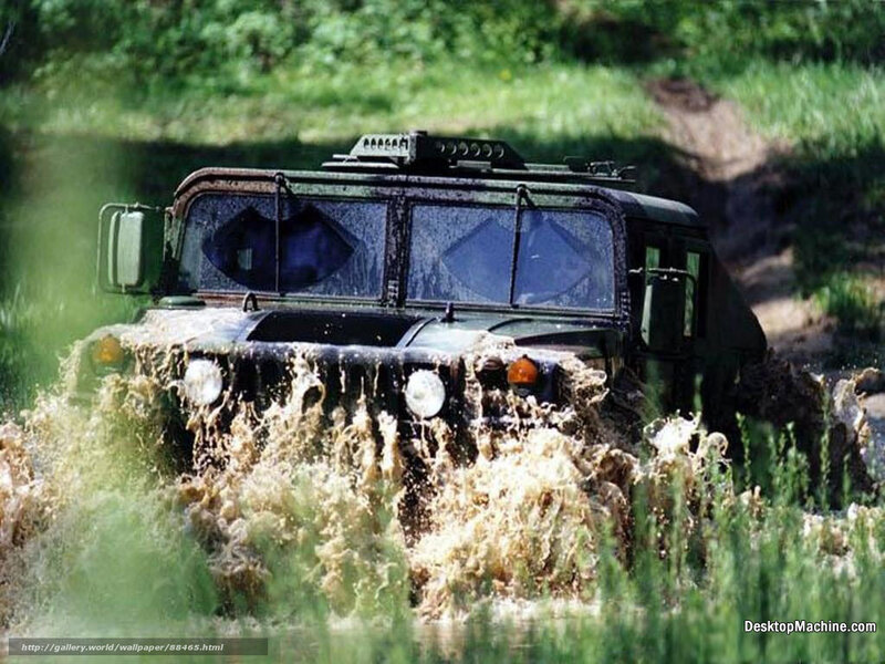 military vehicle in muddy terrain
