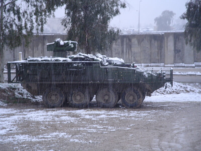 Military vehicle in snowstorm