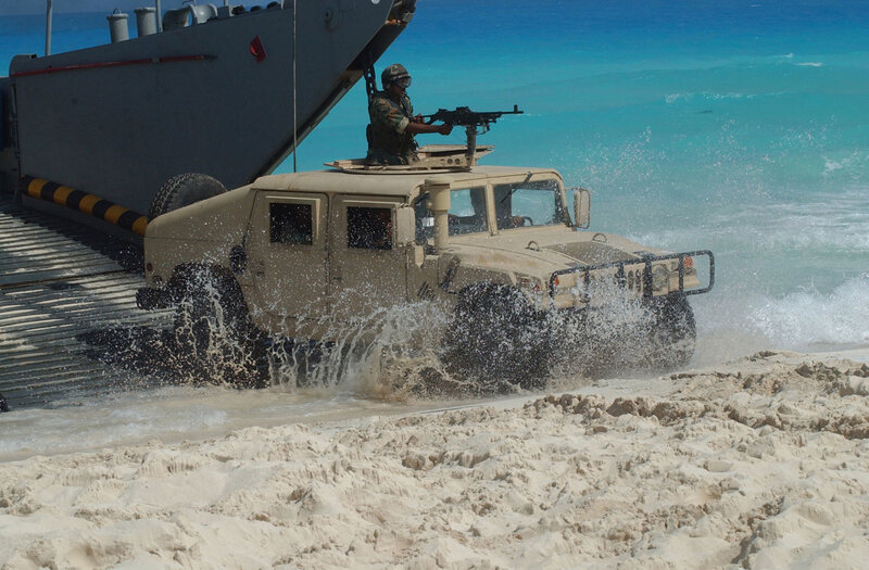 Military vehicle landing on beach