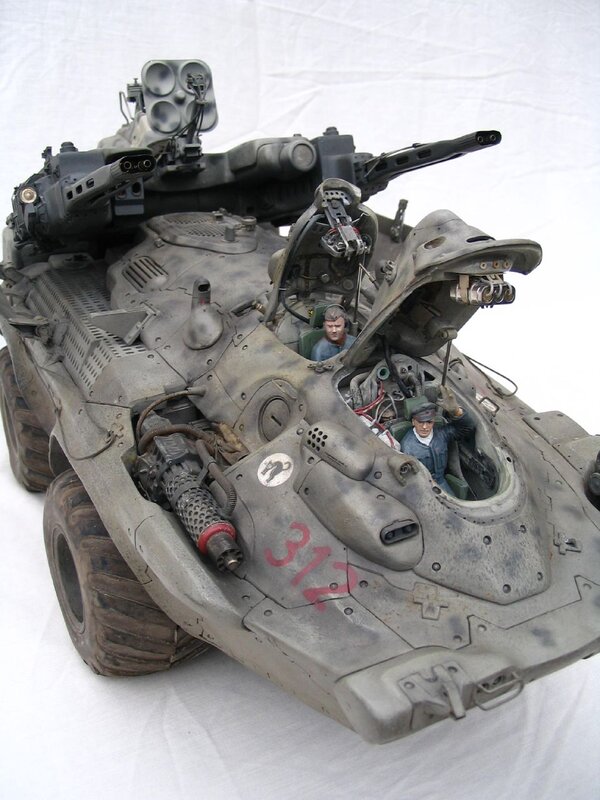 Military vehicle model with crew
