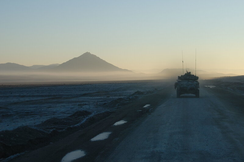 Military vehicle on a desert road