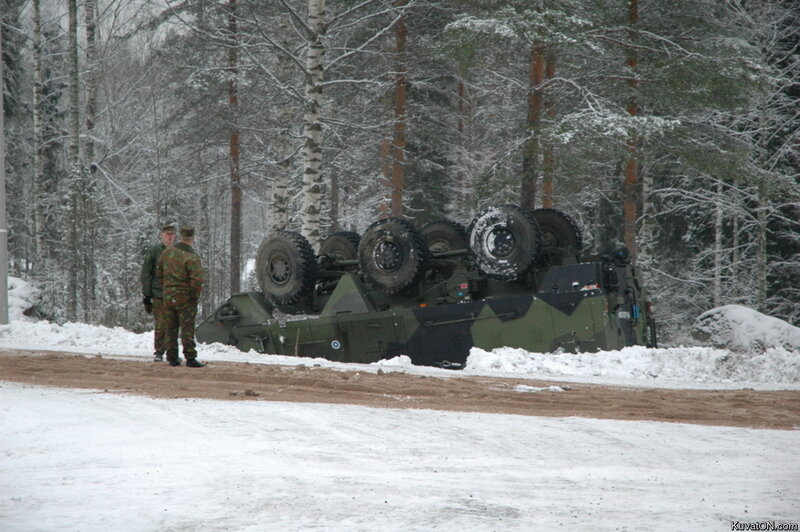 Military vehicle overturned in snow