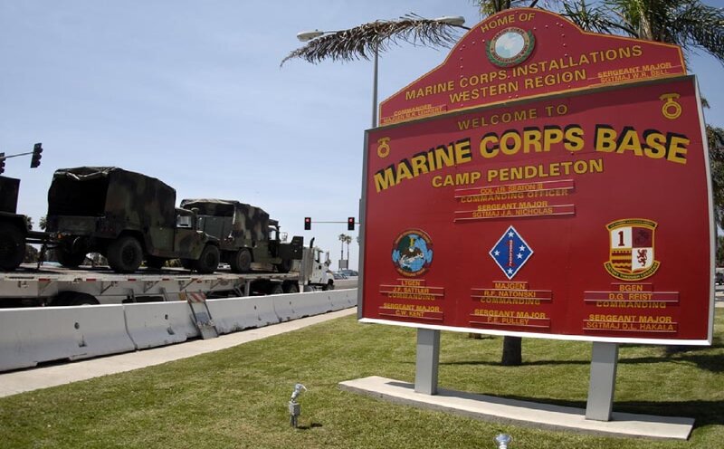 Military Vehicles at Base Entrance