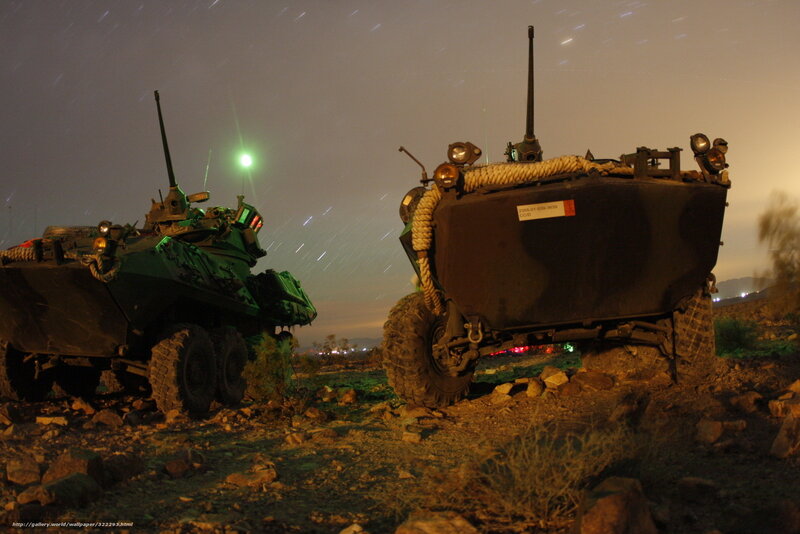 Military vehicles at night
