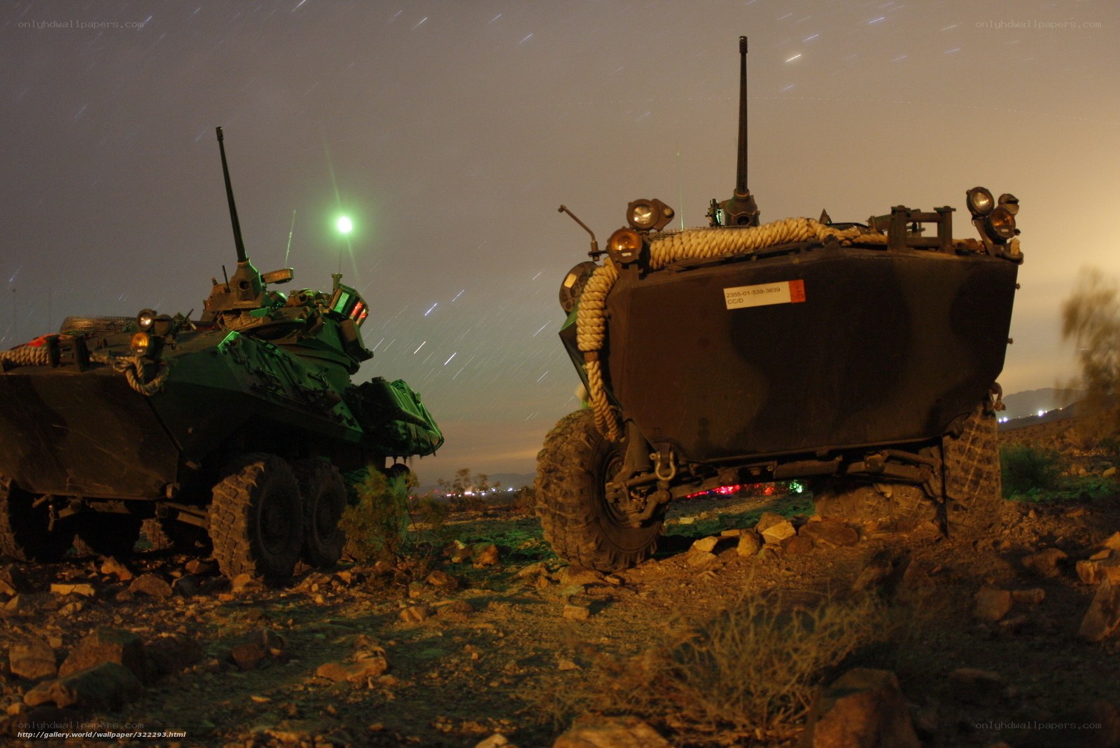 Military vehicles at night