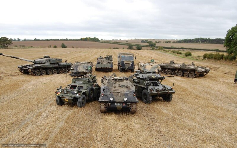 Military vehicles in a field